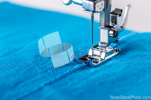 Image of Sewing machine and fabric