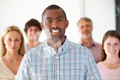 Image of It takes all kinds to make a business work. Shot of a diverse group of colleagues in the office.