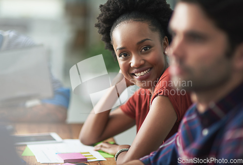 Image of Who said business has to be boring. Cropped shot of a creative businesswoman looking happy at a meeting.