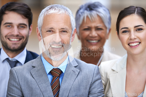 Image of We stand by our word. Shot of a group of confident businesspeople.