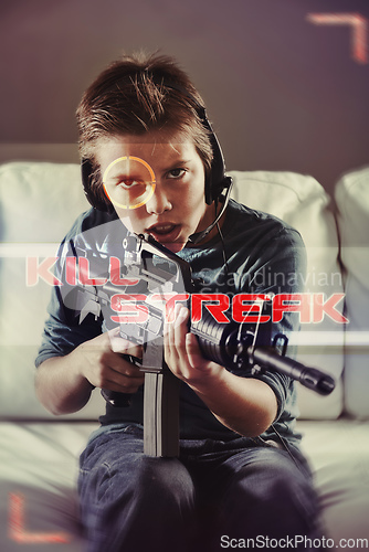 Image of Ive got you. An image of a young boy playing violent video games.