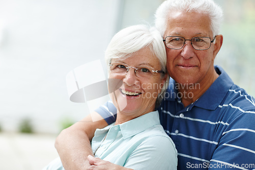 Image of Husband and wife together for life. Shot of a happy senior couple smiling at the camera.