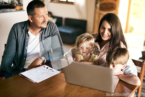 Image of Play, entertainment and learning all in one. Shot of an adorable brother and sister using a laptop with their mother at home.