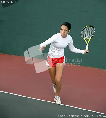 Image of Girl playing tennis