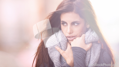 Image of Staying classy in the cold. Cropped shot of a beautiful young woman wearing stylish winter clothing.