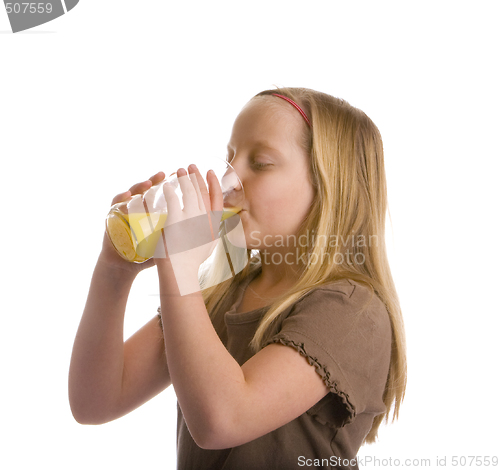 Image of Thirsty Girl Drinking Orange Juice