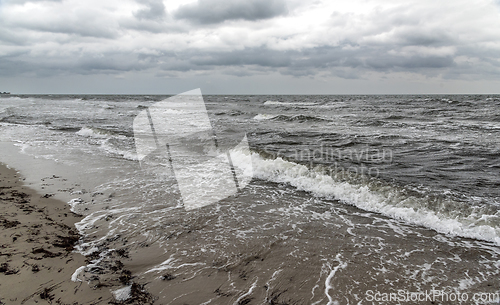 Image of Rough sea and autumn weather on the coast