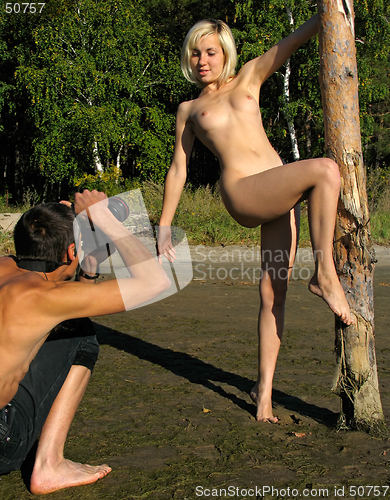 Image of Model posing to photographer