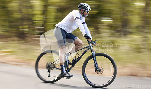 Image of Nature, mountain bike or sports man travel, action and ride bicycle for triathlon challenge, journey or cardio. Cycling competition, fast motion blur or profile of cyclist training for race in France