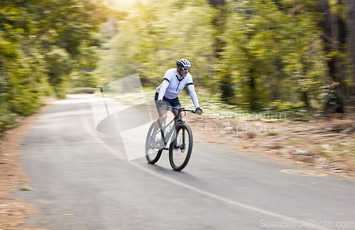 Image of Nature road, mountain bike and sports man travel, ride and adventure on bicycle, triathlon challenge or journey. Cycling competition, motion blur and cyclist training, freedom and workout in France