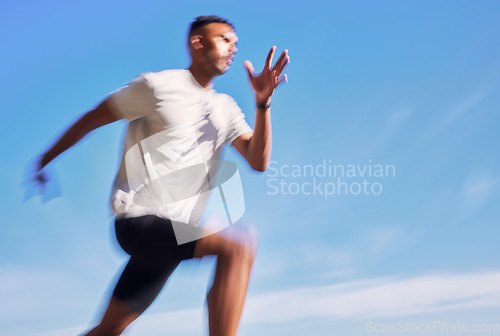 Image of Fitness, exercise and speed of a man running outdoor for workout or training. Blurred athlete person or fast runner in nature for resilience, cardio performance or health on sky mockup space