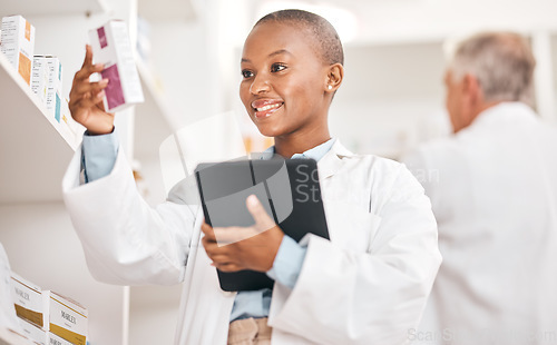 Image of Happy, pharmacy and black woman with a tablet, medical or search internet for medication or pill box for treatment. Healthcare, pharmaceutical and African person with technology or check information