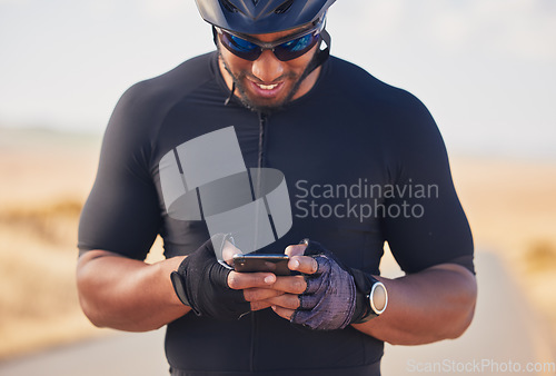 Image of Phone, cycling and nature, happy man at rest stop in countryside looking at direction or map information online. Mobile chat, fitness app and smartphone, cyclist in road on internet search with smile