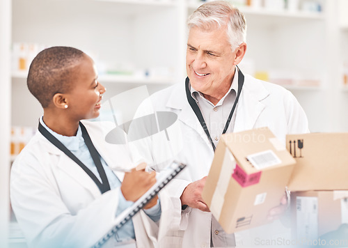 Image of Man, woman and package in pharmacy for checklist, delivery schedule or stock report for medicine. Help, mentor and pharmacist team with inventory list, boxes of pharmaceutical product or medical info