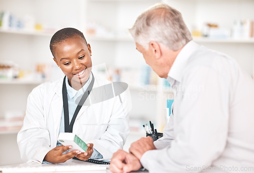 Image of Explain, medication and pharmacist with patient in pharmacy for medical assistance at dispensary. Discussion, medicine and black woman talking to a senior man at the counter of a pharmaceutical store