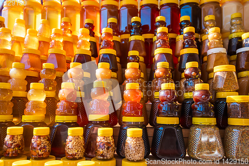 Image of fresh organic honey on farm market