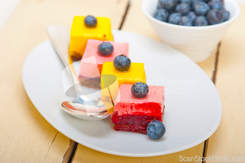 Image of strawberry and mango mousse dessert cake