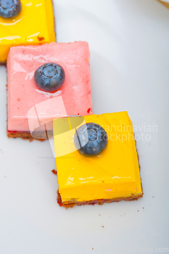 Image of strawberry and mango mousse dessert cake