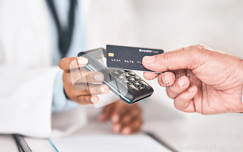 Image of Pharmacist hands, credit card payment and closeup for healthcare, medicine and sales for prescription drugs. Pharmaceutical expert, customer and machine for pos, shopping and fintech for wellness