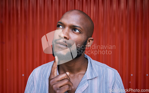 Image of Thinking, outdoor and black man with ideas, solution and problem solving against a red wall background. African person, guy and model with wonder, doubt and fantasy with thoughts, question and choice