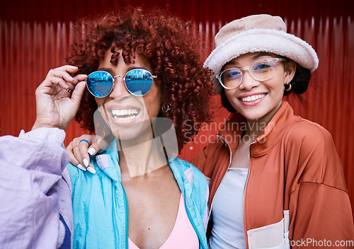 Image of Women in portrait, gen z and fashion, friends are casual and cool with happiness and hipster. Urban streetwear, sunglasses and style with trendy clothes, young people and students with smile