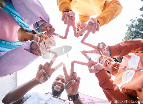 Image of Friends, hands and people outdoor with star symbol for trust, community and fun. Diversity, happiness and below gen z group of men and women with solidarity for teamwork, youth and freedom in nature