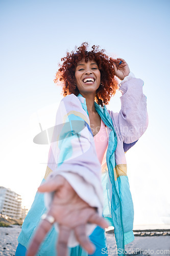 Image of Portrait, happy woman and helping hand, offer or invitation at beach in low angle mockup space. Smile, palm and African person giving assistance in support, care or acceptance of handshake to welcome