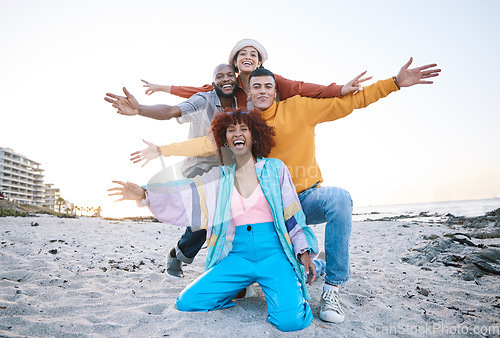 Image of Friends, beach and portrait of people outdoor for travel, motivation and fun on sand. Diversity, happiness and gen z group of men and women for adventure, arms stretched and freedom in nature