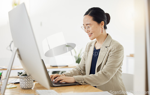 Image of Computer, laptop and business woman in office happy, typing and search for creative, idea or inspiration. Research, smile and Japanese female seo online for social media, information or planning