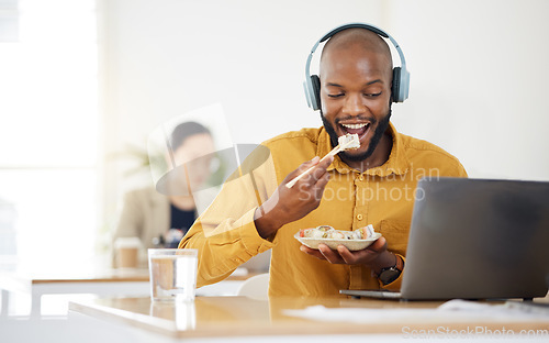 Image of Black business man, laptop and sushi on lunch, video or movie in office for social media, headphones or streaming. African entrepreneur, eating seafood and health on computer, chopsticks or nutrition