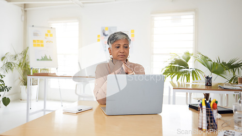 Image of Thinking, anxiety and senior woman with laptop in office worry, waiting and checking email for report. Stress, face and female ceo online for review, feedback or research, problem or deadline mistake