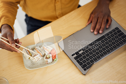 Image of Hands, business man and sushi with laptop, scroll and eating at desk, top view and search in modern office. Employee, computer and chopsticks for seafood, lunch or fish plate for health in workplace