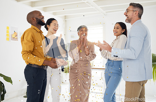 Image of Winner, confetti and party with business people in office for success, celebration and support. Teamwork, target and friends with group of employees for community, achievement and congratulations