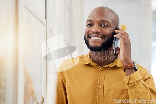 Image of Business, happy black man and phone call for communication, feedback and mobile chat in office. Employee, smile and talking on smartphone for contact, consulting or thinking of conversation at window