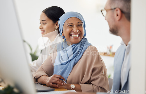 Image of Happy, teamwork and business people in office for training, advice and collaboration while working on a computer. Smile, laugh and Muslim senior woman mentor laugh with work friend while planning