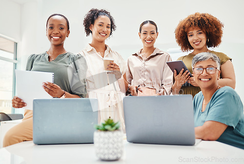 Image of Happy, portrait and women in a business meeting for planning, teamwork or collaboration. Smile, working and diversity of group of people in an office for strategy, partnership and career together