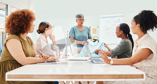 Image of Creative woman, fashion designer and meeting in clothing discussion, style or ideas at the office. Group of female employees in team planning, design or garment in retail startup at the workplace