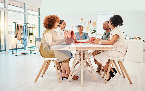 Image of Creative people, fashion design and meeting in brainstorming, team strategy or clothing ideas at office. Group of women designers in retail startup, project plan or teamwork discussion at workplace