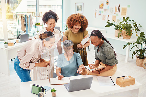 Image of Happy, teamwork or women with laptop for fashion design, planning or draft online for clothing line. Smile, mentor or mature designer speaking, training or talking to people for advice in internship