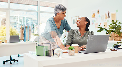 Image of Laughing, teamwork or women with laptop for fashion design or planning online for clothing line. Smile, computer or happy designers speaking or talking to funny mature mentor for advice in internship