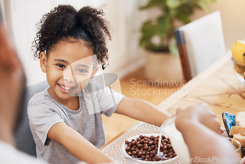 Image of Portrait, breakfast cereal and happy family kid smile for morning food, wellness and parent pour milk liquid. Home dining room, happiness and young child, youth girl and hungry for meal