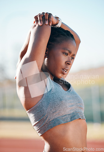 Image of Sports, exercise and woman stretching outdoor at a stadium for workout, training and warm up. African athlete person for muscle stretch, fitness and wellness or flexibility for a run or competition