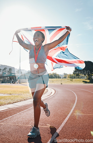 Image of Runner, achievement and black woman with celebration, UK flag and sports with competition, pride and winner. African person, happy athlete or champion with British symbol, pride and medal for winning