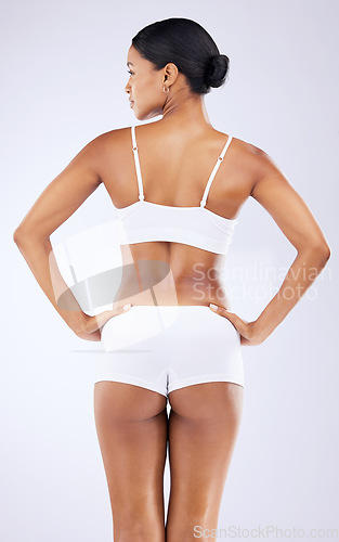 Image of Epilation, underwear and back of woman in studio with wellness, health and weightloss routine. Beauty, body and full length of female model with cosmetic liposuction for self care by white background