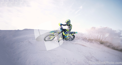 Image of Motorcycle, sand and mockup with a sports man riding a vehicle in the desert for adventure or adrenaline. Bike, training and space with an athlete outdoor in nature for freedom, power or competition