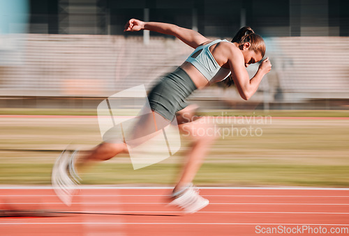 Image of Action, race and athlete running sprint in competition for fitness game and training for energy wellness on a track. Sports, stadium and athletic person or runner exercise, speed and workout
