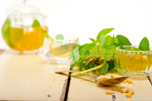 Image of Arab traditional mint and pine nuts tea