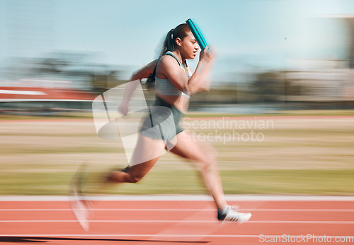 Image of Action, speed and woman athlete running relay sprint in competition for fitness game and training for energy wellness on a track. Sports, stadium and athletic person or runner exercise and workout