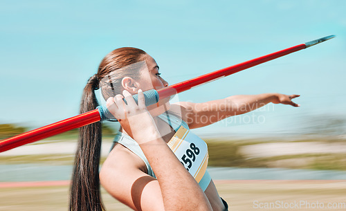 Image of Woman, javelin and athlete in sports competition, practice or olympic training in fitness on stadium field. Active female person or athletic competitor throwing spear, poll or stick in distance