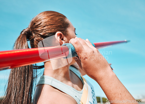 Image of Woman, javelin and olympic athlete in sports competition, practice or training in fitness on stadium field. Active female person or athletic competitor throwing spear, poll or stick in distance